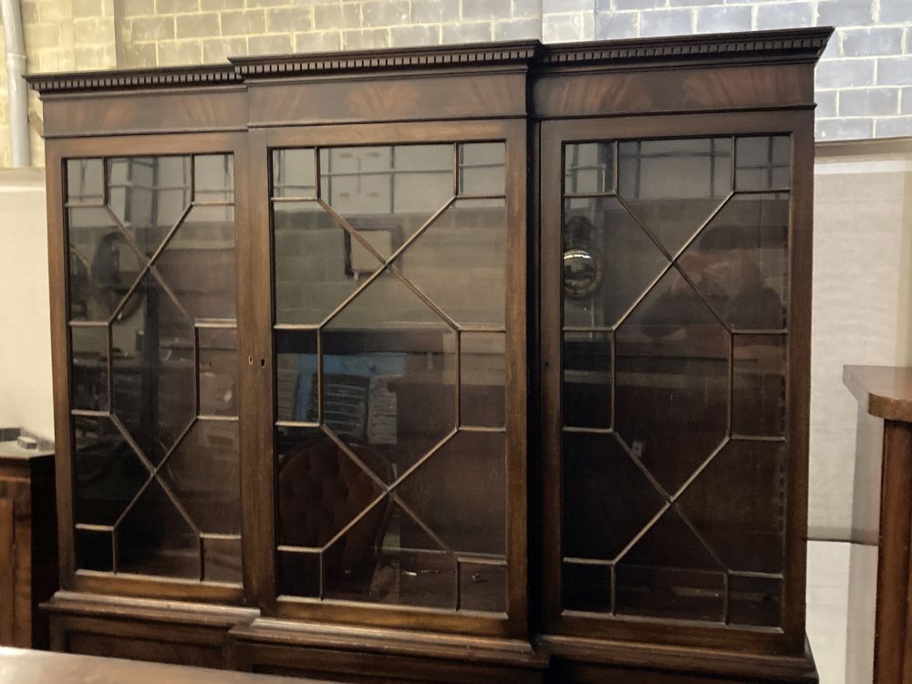 A reproduction George III-style mahogany breakfront library bookcase, width 172cm, depth 40cm, height 199cm